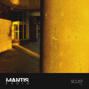 Yellow sunlit concrete corridor and doorway - sclist Mantis Radio flyer