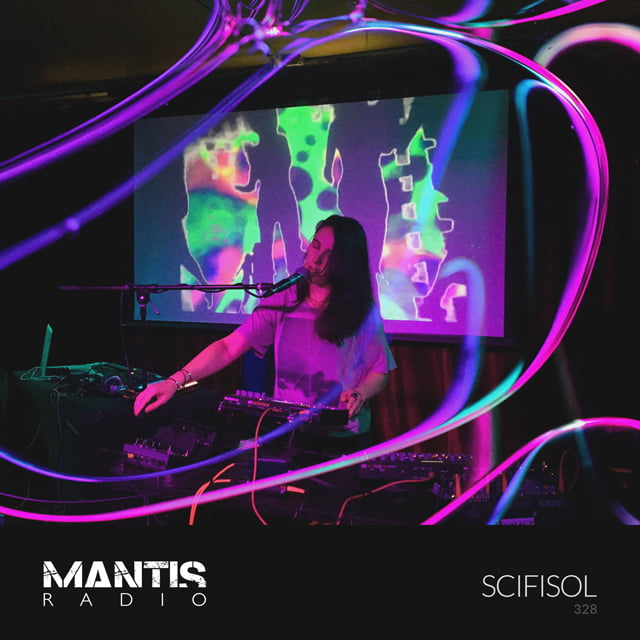 SciFiSol performing wrapped in purple swirls - Mantis Radio